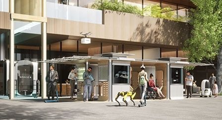 A person walks down the street with SPOT, the robotic dog.